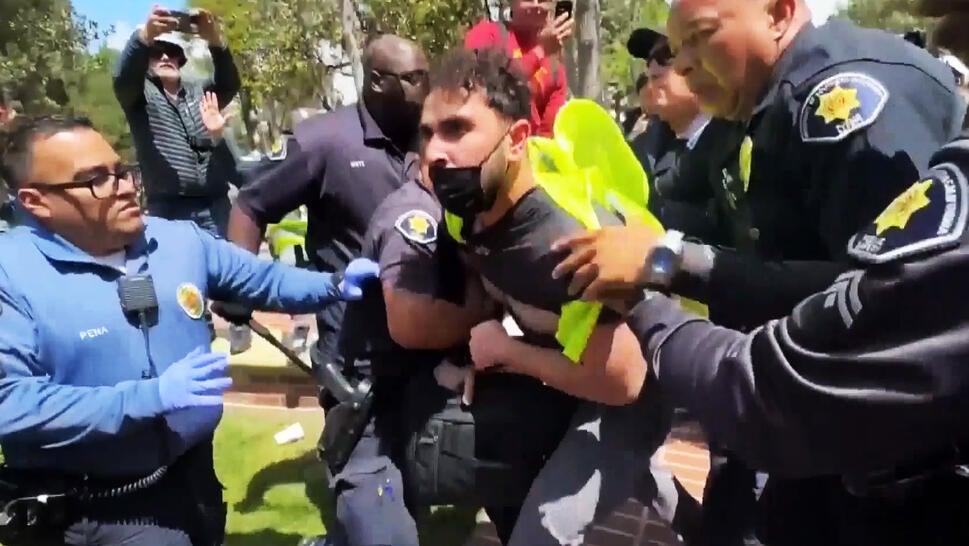 Protester being arrested 