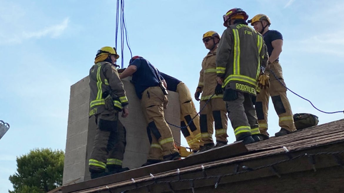 Firefighters used a rope system in order to rescue the 18-year-old who accidentally got stuck in her chimney.