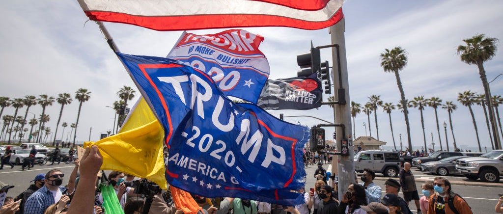 Group gathered for white lives matter rally with trump 2020 flag