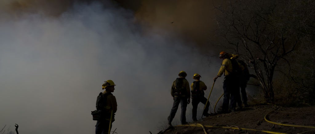 California wildfire smoke with firefighters on scene