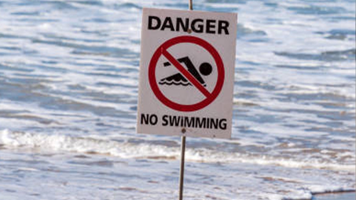 A stock image of a "No Swimming," sign. 