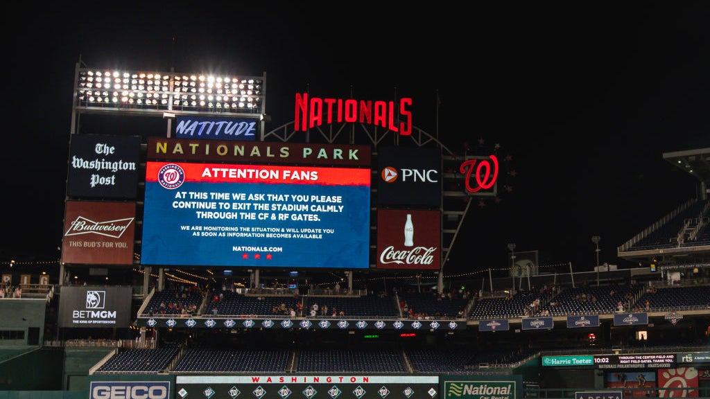 Digital sign in the Padres and Nationals' game that asks fans to exit slowly