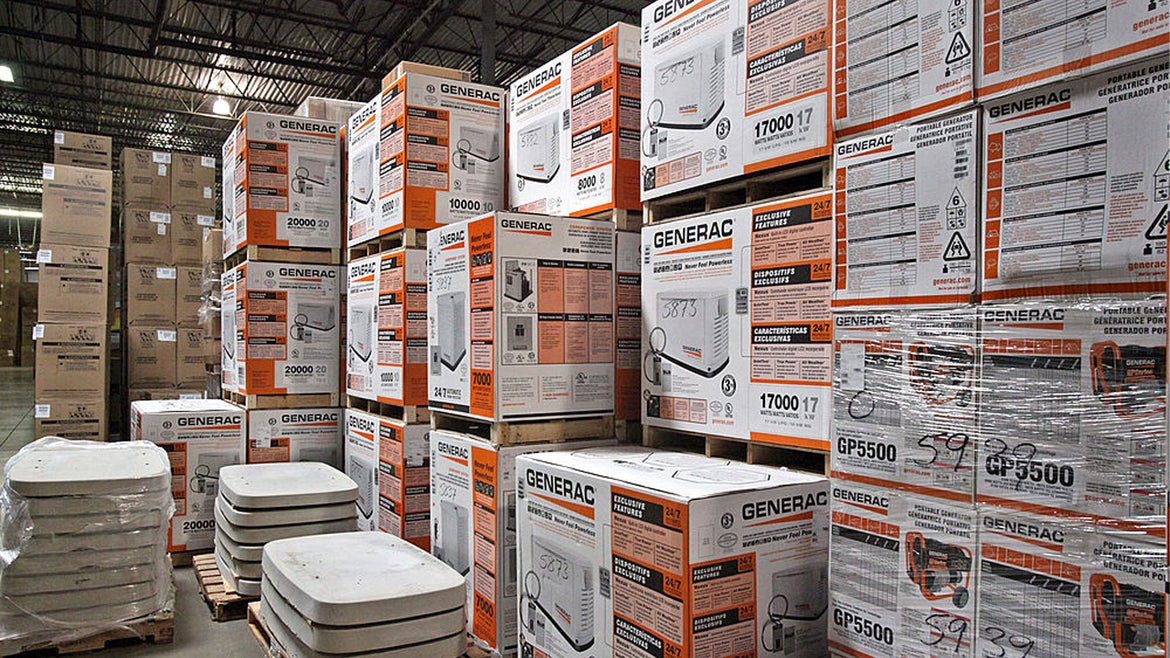 Generac Holdings Inc. generators sit stacked at the ABT Inc. warehouse in Glenview, Illinois, U.S., on Monday, Oct. 10, 2011. 