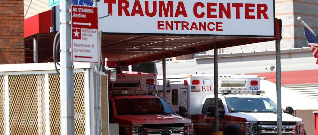 Ambulance vehicles near Elmhurst trauma entrance