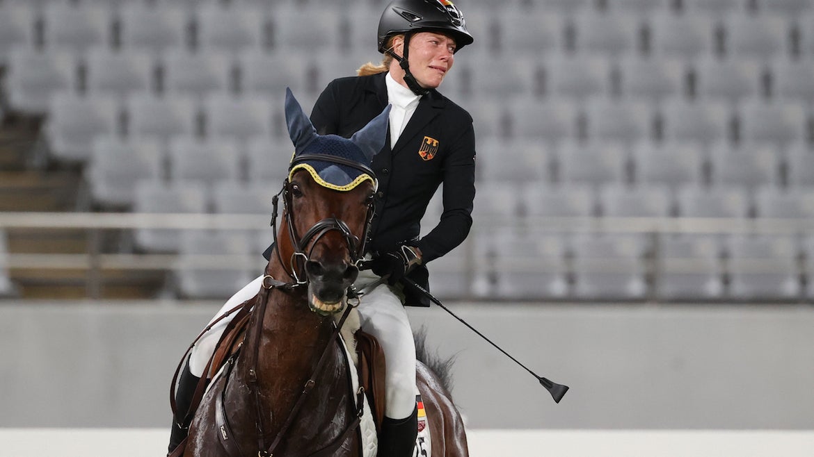 Germany's Annika Schleu competes in the women's individual riding show jumping event during the modern pentathlon competition at the 2020 Summer Olympic Games, at Tokyo Stadium