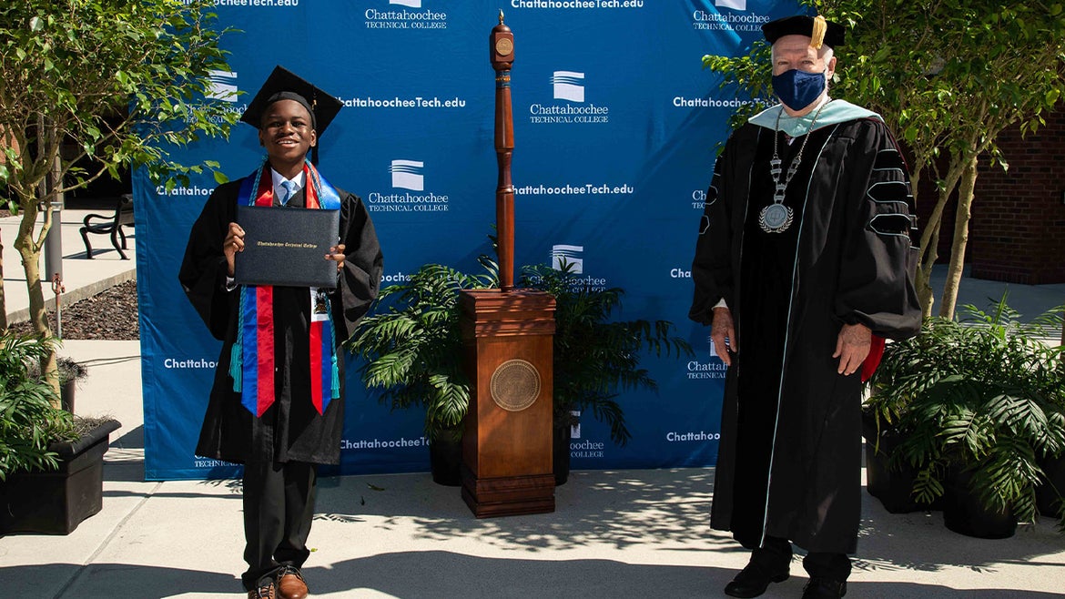 Anderson smiling after receiving degree from Chattahoochee Tech