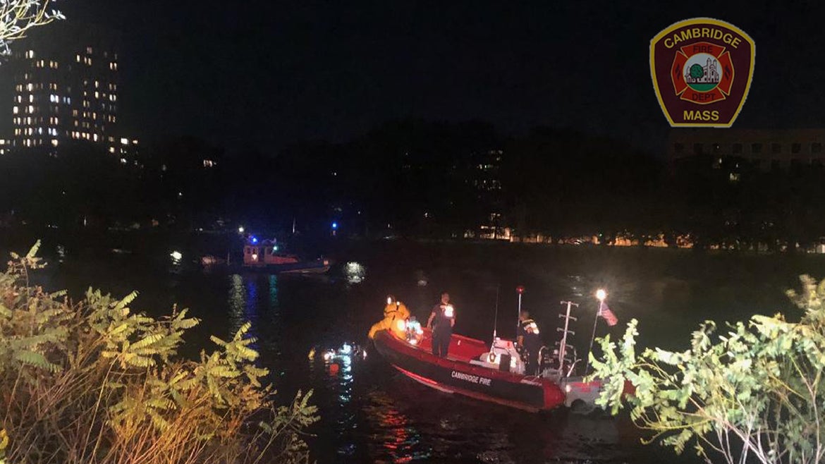 Cambridge Fire Department during rescue after car plunges in Charles River.