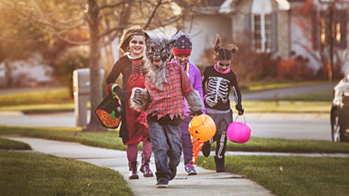 A stock image of children trick-or-treating.