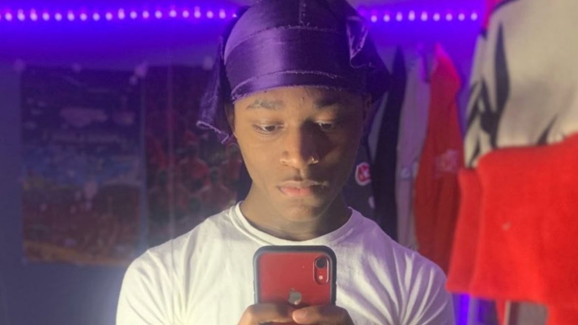 Fredarrious Wilson, Black 18-year-old, wearing white tshirt and purple durag