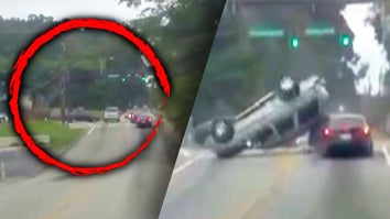 Car with red circle graphic / overturned SUV