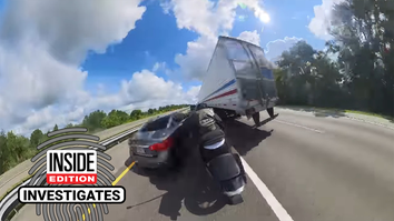Motorcyclist "Lane Splitting" on busy Florida highway