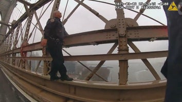 A person experiencing a mental health crisis was helped down from the Brooklyn Bridge by officers from the New York Police Department’s 5th Precinct.