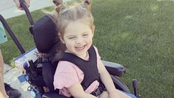 Smiling little girl in wheelchair