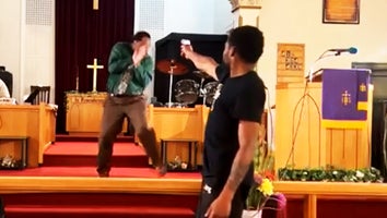 Man points gun at pastor