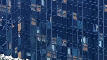 Broken windows of Houston high-rises 