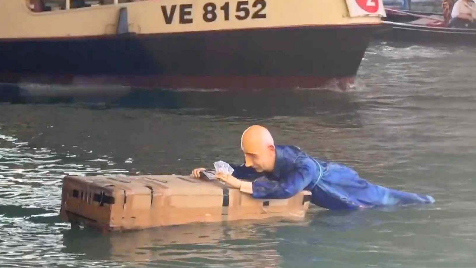 Protestors Launch Life-size Bezos Mannequin Into Venice Canal Ahead of  Wedding