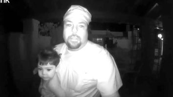 Man in nurse uniform speaking into ring doorbell