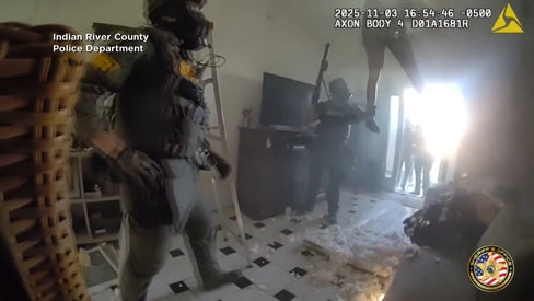 Suspect Falls Through Ceiling