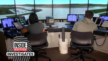 Two young adults sitting at an air traffic control station monitoring 