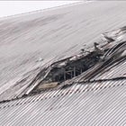 Jagged hole in roof of Chernobyl containment structure