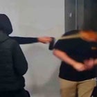 Jason Nguyen being bear sprayed in the face by two men dressed in all black