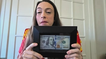 Robyn Gentry with framed $100