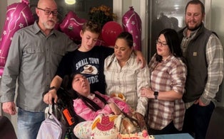 Family Celebrates 20th Birthday of Daughter Born Without a Brain