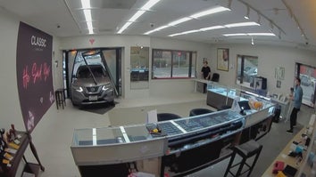 Security footage of an SUV crashing through the front of a jewelry store