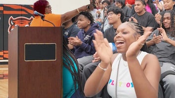School official points toward a crowd of student / Students clapping in bleachers