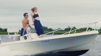 A scene from 'Love Story' where actors portray JFK Jr & Carolyn Bessette on a boat