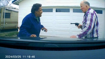 Dashcam footage of William Brock pointing a gun at Lo-Letha Hall