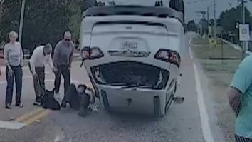 Officer Rescues Sisters Trapped In Overturned SUV