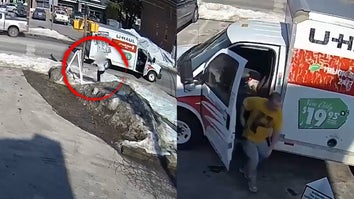 Woman running from U-Haul truck, man gets out of U-Haul truck