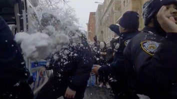 NYPD officers being hit with snowballs