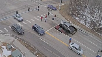 Giant Sinkhole Swallows Two Cars