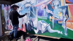 Artist Recreates Picasso’s Guernica on Destroyed Bridge in Ukraine 