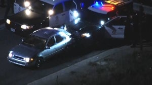 Police Chase Suspect Backs Into Cop Car After Getting Stuck in Traffic: Report