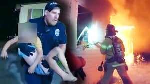 Bodycam Footage Shows Rescuers Save 3-Year-Old From Burning Trailer in Michigan