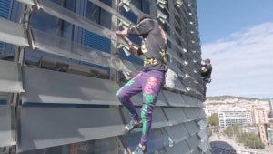 ‘French Spiderman’ Alain Robert Scales Barcelona’s Tallest Building With Son
