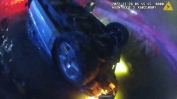 Cops Rescue 2 People From Car Upside Down in Ravine
