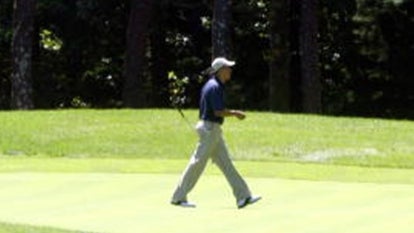 Former President Obama playing golf at Martha's Vineyard.