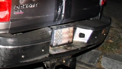 Truck of man arrested without license plate, American flag instead