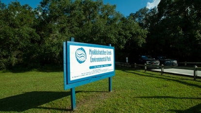 The entrance to the Myakkahatchee Creek Environmental Park on October 20, 2021 in North Port, Florida. The FBI announced that human remains and personal items belonging to Brian Laundrie iwere found there. 