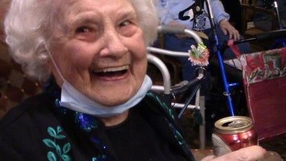 Margaret DiLullo celebrates her 107th birthday by kicking back with her favorite lager.