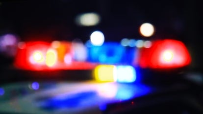 blurry image of police sirens at night