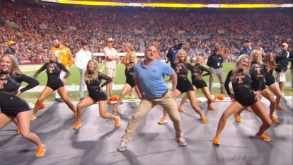 University of Tennessee Dance Team Advisor Dances With Team on Football Field