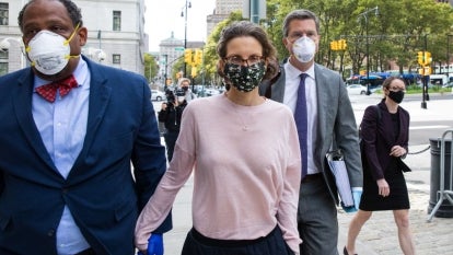 Clare Bronfman, daughter of former Seagram Chairman Edgar M. Bronfman, center, arrives at federal court in the Brooklyn borough of New York on Sept. 30, 2020.