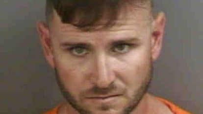 A mugshot of Joshua David Lewis, 35, of Chokoloskee, Florida.