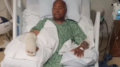 Jimmy Lindsey lying in hospital bed