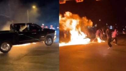Wild Car Stunt Leaves Bystanders on Fire 